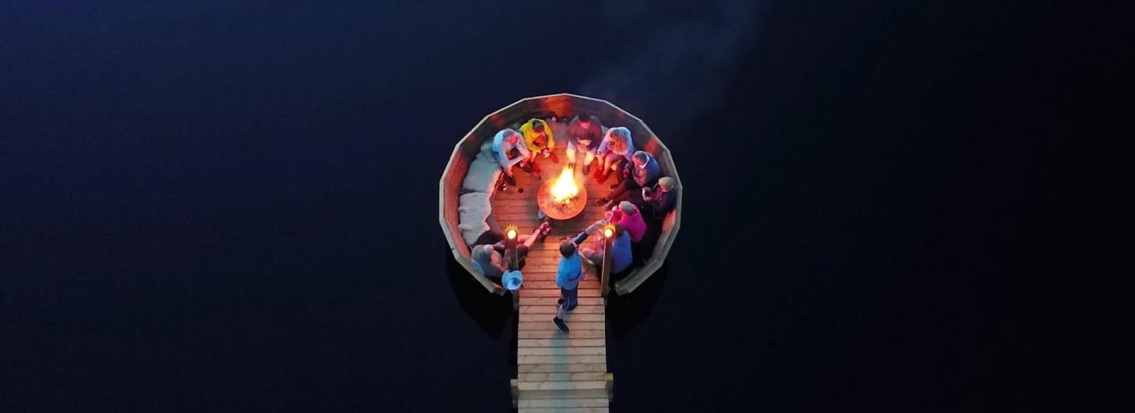 group bonfire on a dock