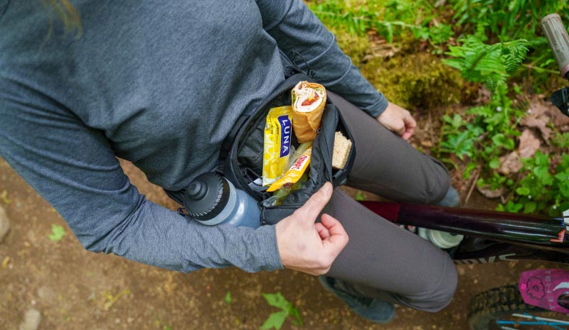 Biker with food stored in pack