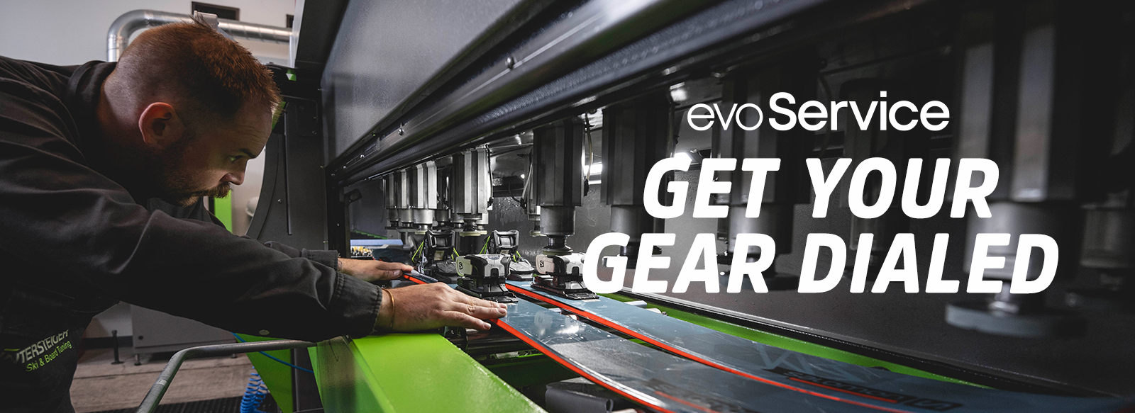 Ski service technician tuning skis