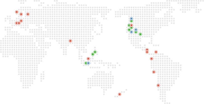 A photo of a globe with evo locations pinned on it'