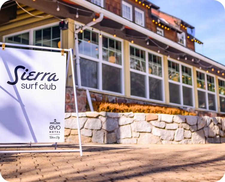 A photo of a building, with a sign saying 'Sierra Surf Club'